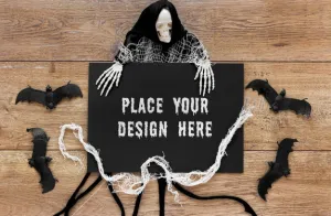 Free Bats And Skeleton On Wooden Table Psd